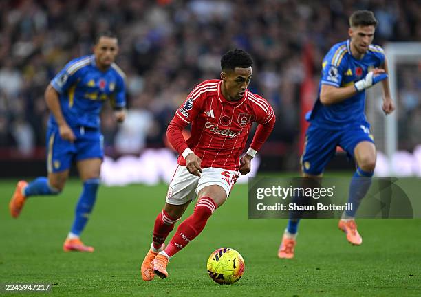 NOTTINGHAM, ENGLAND Omari Hutchinson of Nottingham Forest runs with the ball during the Premier League match between Nottingham Forest and Leeds...