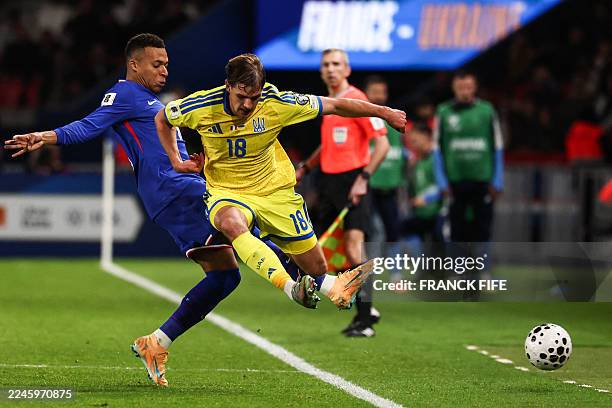 France's forward Kylian Mbappe fights for the ball with Ukraine's midfielder Yehor Yarmolyuk during the 2026 World Cup qualifiers Europe zone group D...