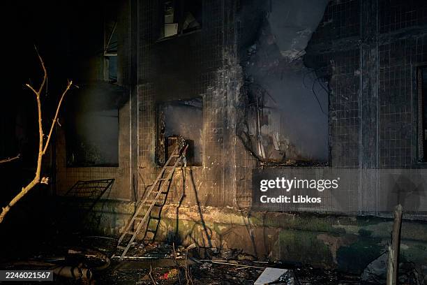 The aftermath of damage to a residential building is seen following a strike during an air raid alert, on November 14, 2025 in Kyiv, Ukraine.