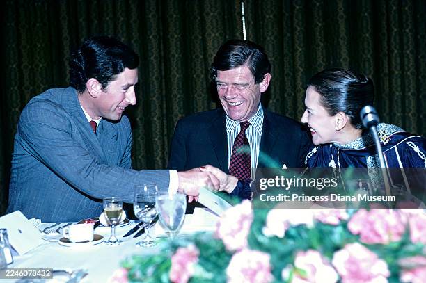 Prince Charles, Prince of Wales greets unidentified dignitaries at a banquet during a Royal visit, Rio De Janeiro, Brazil, between March 8 & 16, 1978.