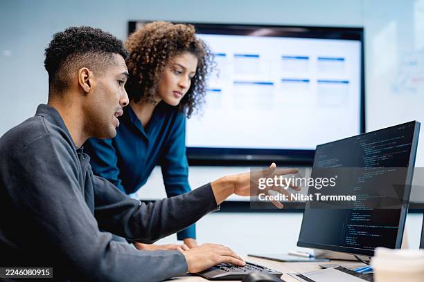 ensuring that the system meets technical requirements, such as security, accessibility, latency, load, reliability, and sustainability, is a key goal of the software testing process. - software development team stock pictures, royalty-free photos & images