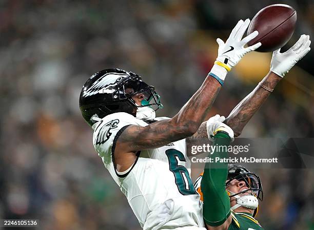 DeVonta Smith of the Philadelphia Eagles catches a 36 yard touchdown pass against Evan Williams of the Green Bay Packers during the fourth quarter in...