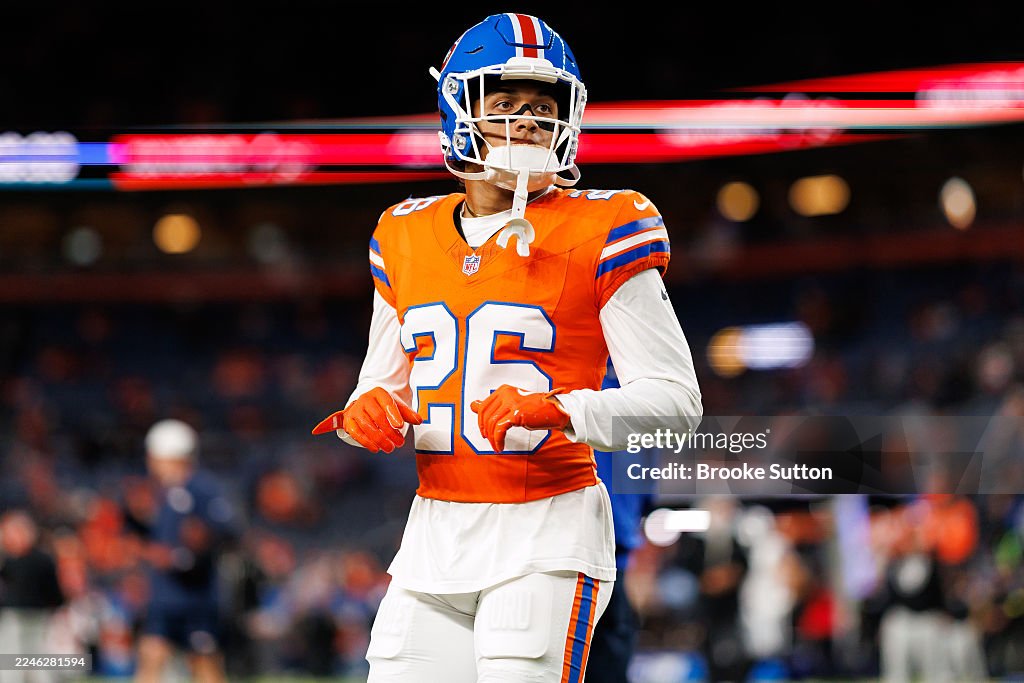 Debon Key Devon Key of the Denver Broncos warms up prior to an NFL football ...