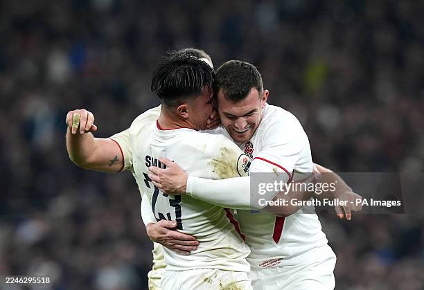 England's Marcus Smith and Ben Spencer celebrate following the Quilter Nations Series match at the Allianz Stadium, London. Picture date: Saturday...
