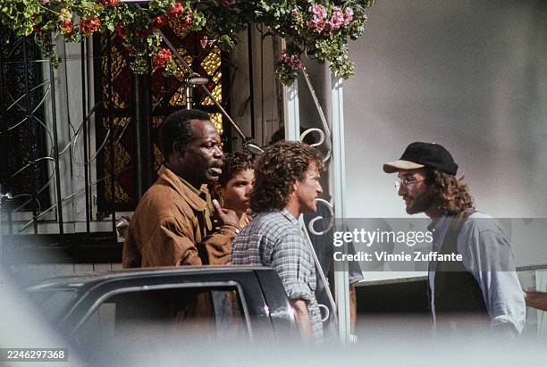 American actor Danny Glover, wearing a tan leather jacket, American actress Traci Wolfe, American actor and film director Mel Gibson, who wears a...