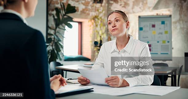 business, people or discussion with resume in interview for hiring process, career experience or faq. hr manager, candidate or cv with questions in meeting for recruitment, job opportunity or vacancy - vacancy stock pictures, royalty-free photos & images