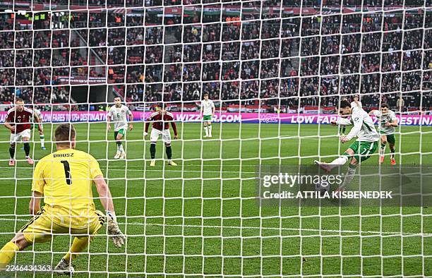 Ireland's forward Troy Parrott kicks the ball to score the 1-1 through a penalty shot during the FIFA World Cup 2026 Group F European qualification...