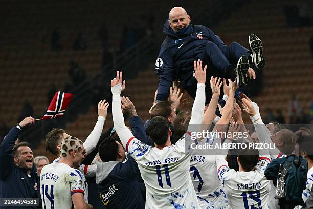 Norway's headcoach Staale Solbakken his celebrated by players after their victory during the FIFA World Cup 2026 European qualification football...