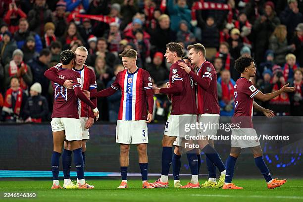 Erling Haaland of Norway celebrates scoring his team's fourth goal with teammates during the FIFA World Cup 2026 qualifier match between Norway and...