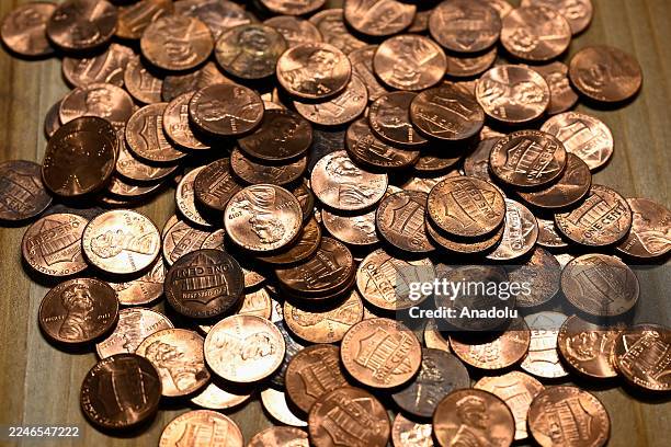 Pennies are seen as piled up in Foster City, California, United States on November 16, 2025. On November 12, the United States Mint officially ended...
