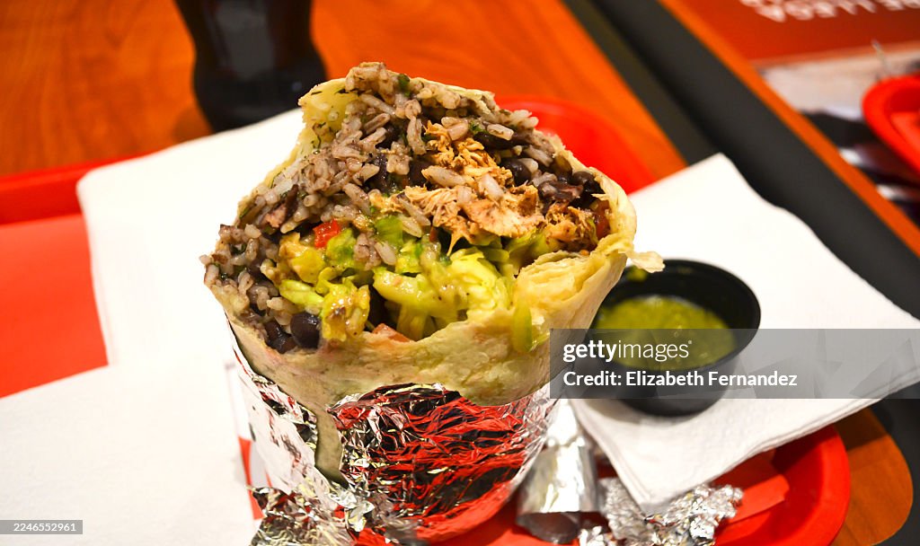 Fresh Burrito Filled With Rice, Chicken, And Vegetables