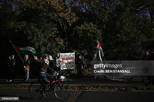 Supporters of alleged Palestine Action activists accused of breaking into Israeli-based defence firm Elbit Systems' site in Bristol in August 2024,...