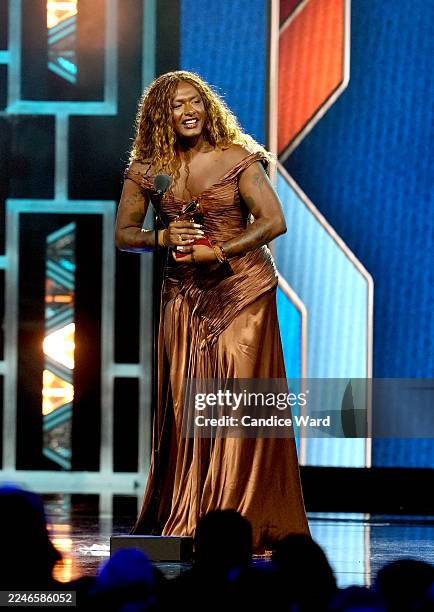 Liniker accepts the award for Best Portuguese Language Song for "Veludo Marrom” during the 26th Annual Latin GRAMMY Awards Premiere Ceremony at the...