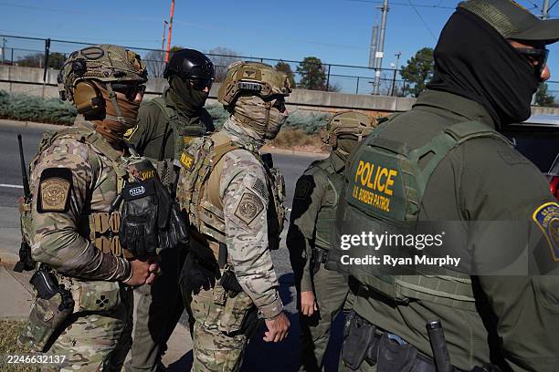 Federal agents search for undocumented immigrants on November 17, 2025 in Charlotte, North Carolina. Federal agents are carrying out "Operation...