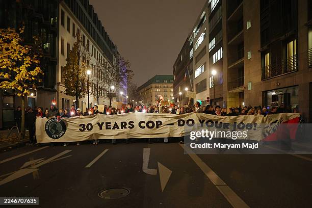 Climate activists of the Fridays for Future movement gather at the Brandenburg Gate to demand that Chancellor Friedrich Merz do more to ensure...