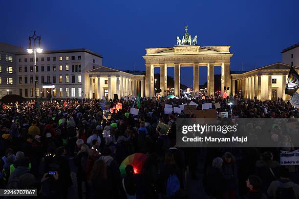 Climate activists of the Fridays for Future movement gather at the Brandenburg Gate to demand that Chancellor Friedrich Merz do more to ensure...
