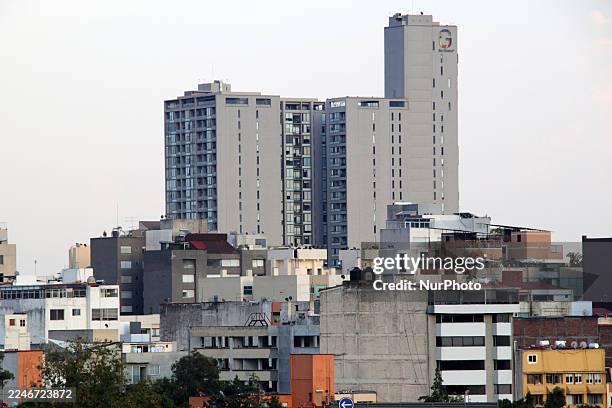 Several buildings are seen in a panoramic shot in Mexico City, Mexico, on November 17, 2025.