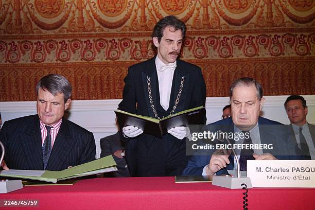 Of Thomson-CSF Alain Gomez and French Interior minister Charles Pasqua sign an agreement for the "generalization across the entire territory" of the...