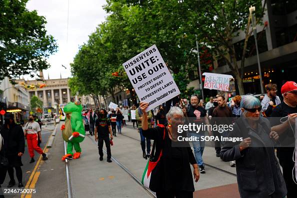 Sample Rally Placards A protester holds a placard during the rally. A rally is held... News ...