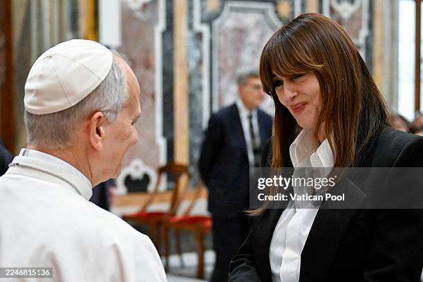 Pope Leo XIV greets Monica Bellucci during an audience with the Film Industry at the Clementine Hall on November 15, 2025 in Vatican City, Vatican....