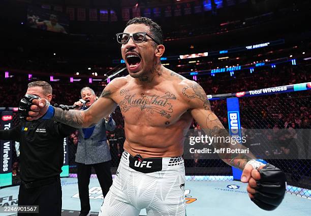 Carlos Prates of Brazil reacts to his knockout win over Leon Edwards of Jamaica in a welterweight fight during the UFC 322 event at Madison Square...
