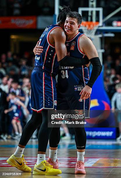 Troy Brown Jr and Dejan Vasiljevic of the 36ers celebrate the final whistle during the round nine NBL match between Adelaide 36ers and Cairns Taipans...