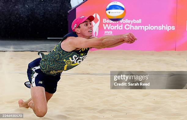 Paul Burnett in action in his match with Thomas Hodges against Brazil's Andre and Renato during the 2025 Beach Volleyball World Championships at The...