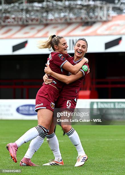 Amber Tysiak of West Ham United celebrates scoring her team's second goal with teammate Shelina Zadorsky during the Barclays Women's Super League...