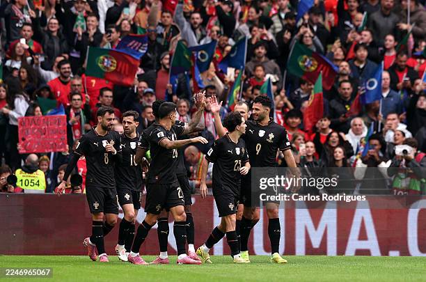 Goncalo Ramos of Portugal celebrates scoring his team's second goal with teammates during the FIFA World Cup 2026 qualifier match between Portugal...