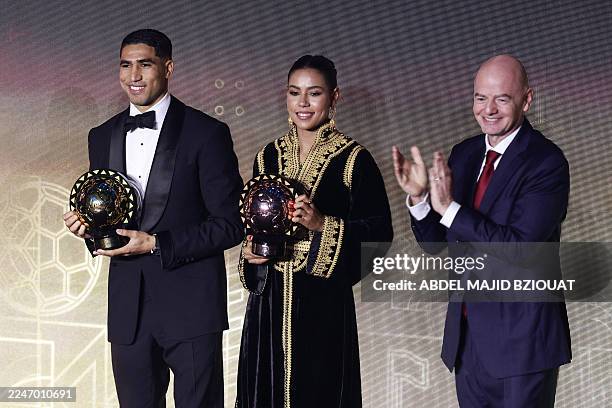 Paris Saint-Germain's Moroccan defender Achraf Hakimi , African Men's Player of the Year, and Al-Hilal's forward Ghizlane Chebbak , African Women's...