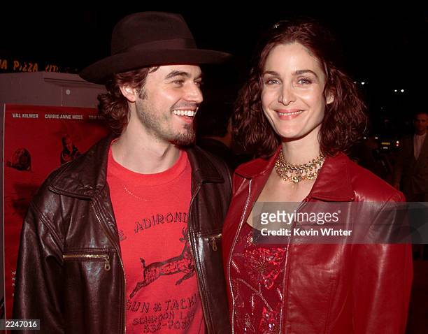 Carrie-Ann Moss and her husband Steven Roy at the World Premiere of 'Red Planet' at the Village Theater in Los Angeles, Ca. 11/6/00.