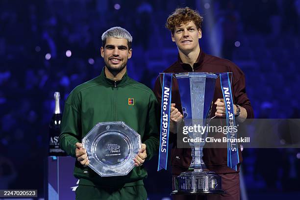 Winner Jannik Sinner of Italy poses for a photo with runner up Carlos Alcaraz of Spain following the Men's Singles Final on day eight of the Nitto...