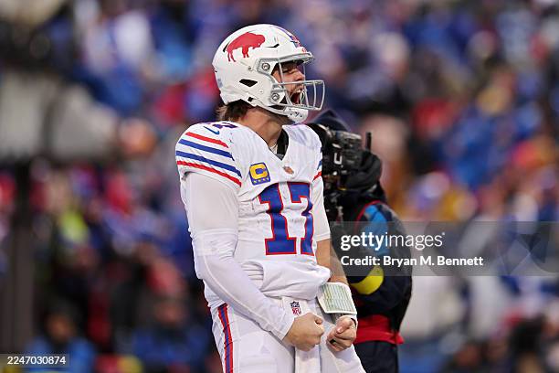 Josh Allen of the Buffalo Bills reacts after scoring a touchdown during the fourth quarter against the Tampa Bay Buccaneers at Highmark Stadium on...