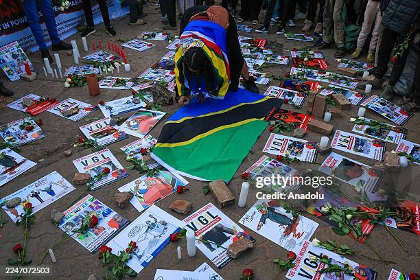 Activists hold a candlelight vigil to commemorate those who lost their lives in post-election violence in Tanzania, in Nairobi, Kenya on November 20,...
