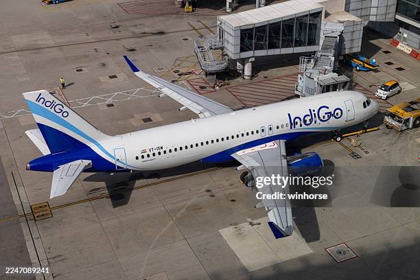 indigo airbus a320neo - indigo stock pictures, royalty-free photos & images