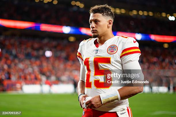 Patrick Mahomes of the Kansas City Chiefs walks off the field after the 22-19 loss to the Denver Broncos at Empower Field at Mile High on November...