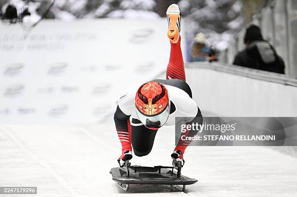China's Yin Zheng competes in the men's skeleton race at the IBSF Bobsleigh and Skeleton World Cup during the Olympic Winter Games Milano Cortina...