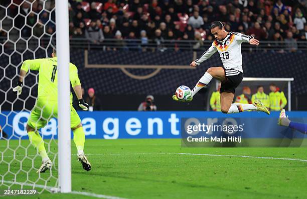 Leroy Sane of Germany scores his team's fourth goal during the FIFA World Cup 2026 qualifier match between Germany and Slovakia at Red Bull Arena on...