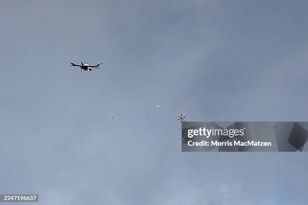 Counter-drone interceptor fires a catching net during a live presentation as part of the Project Flytrap 4.5 exercise of counter-drone technologies...