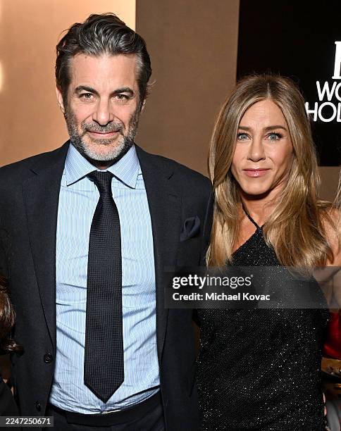 Jim Curtis and Jennifer Aniston, wearing Ralph Lauren, attend ELLE's 2025 Women in Hollywood Celebration presented by Ralph Lauren and Bvlgari with...