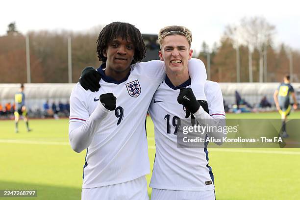 Shumaira Mheuka of England celebrates scoring his team's second goal with teammate Jesse Derry during the European Under 19 Championships Qualifying...