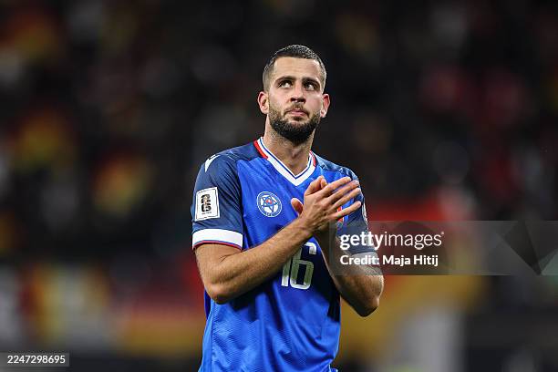 David Hancko of Slovakia reacts following the FIFA World Cup 2026 qualifier match between Germany and Slovakia at Red Bull Arena on November 17, 2025...
