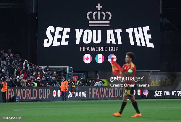 Text saying "see you at the FIFA World Cup" is shown on the screen inside the stadium after Belgium qualify during the FIFA World Cup 2026 qualifier...