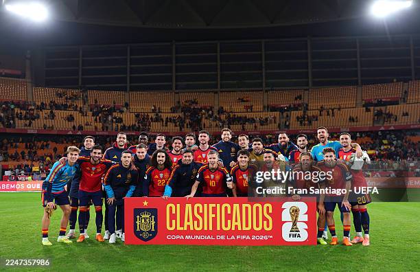 Spain players celebrate qualifying after the FIFA World Cup 2026 qualifier match between Spain and Türkiye at Estadio de La Cartuja on November 18,...