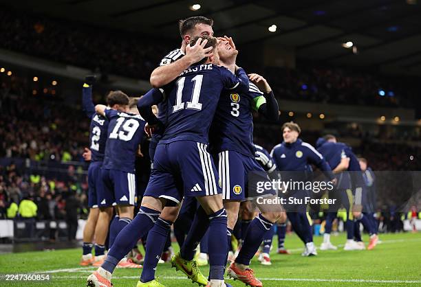 Andy Robertson of Scotland celebrates his team's fourth goal scored by Kenny McLean of Scotland during the FIFA World Cup 2026 qualifier match...
