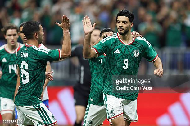 Raul Jimenez of Mexico celebrates with his teammates after scoring a penalty during an international friendly match between Mexico and Paraguay at...