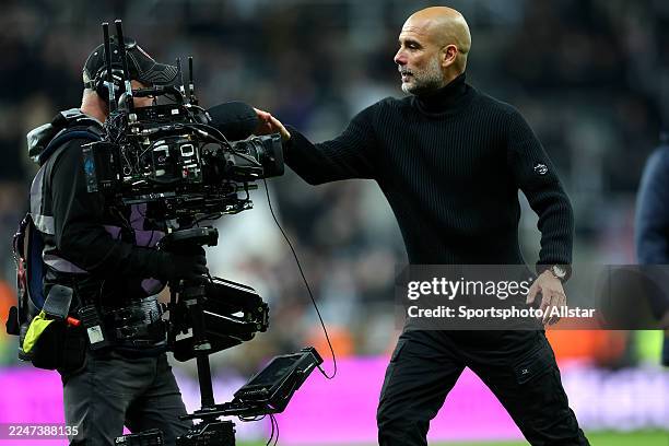 Pep Guardiola complains to TV cameraman after the Premier League match between Newcastle United and Manchester City at St James' Park on November 22,...