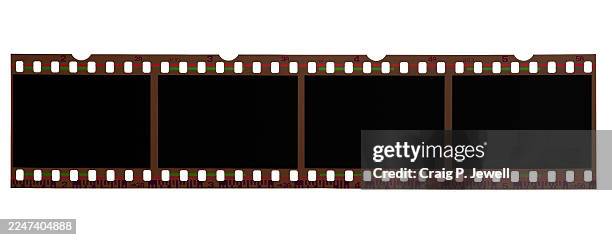 4 panel strip of retro 35mm film isolated on a white background - film negative stock pictures, royalty-free photos & images