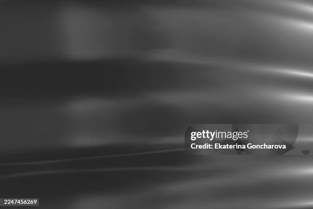 abstract metallic motion: smooth gray waves and reflective texture for modern design - chrome stock pictures, royalty-free photos & images