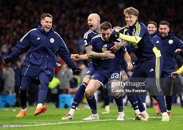 Scotland player Kenny McLean celebrates with Lyndon Dykes and team mates after scoring the fourth Scotland goal during the FIFA World Cup 2026...